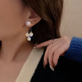 2022 ZIRCON ROUND PETAL EARRINGS